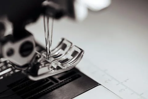 Fragment of the sewing machine closeup Stock Photos