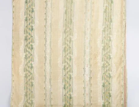 Fragment of silk fabric pattern made by stripes filled with lace motifs an... Stock Photos