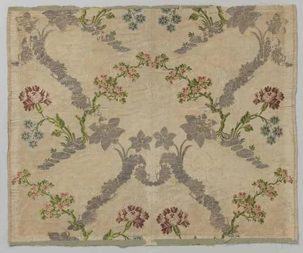 Fragment silk tissue with lace pattern and flower vines. Fragment of two p... Stock Photos