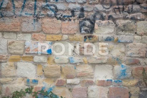 Fragment of a wall from a chipped stone Stock Photos