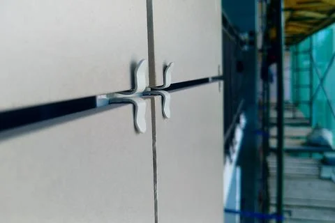 Fragment of the wall closed with a ventilated facade, Installation works and  Stock Photos