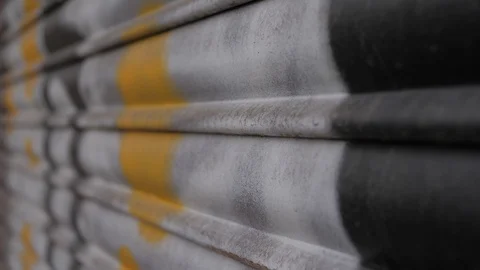 Fragment of a wall with graffiti. Abstract background close up macro paint Stock Footage 103193330