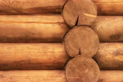 Fragment of a wall made of logs. Stock Photos