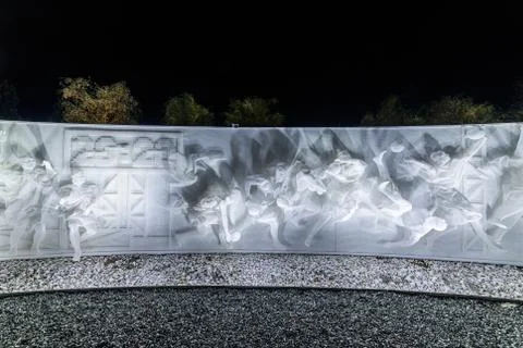 Fragment of white multi-figured bas-relief made of plastic mesh by artists Re Stock Photos