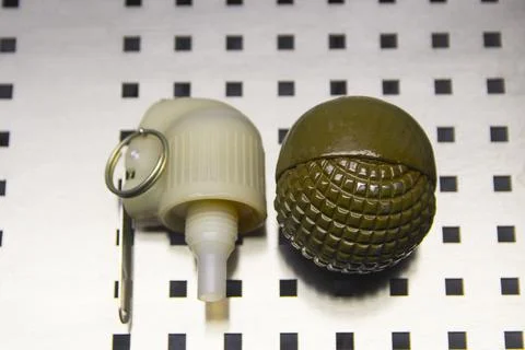 Fragmentation, combat grenade disassembled close-up Stock Photos