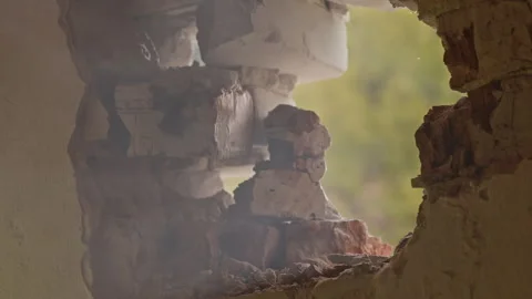 Fragmented Wall View Through a Hole, showcasing a complex array of shapes and Stock Footage 314569215