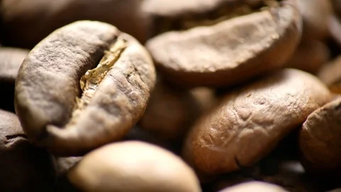 Fragrant coffee beans are roasted in a frying pan. The composition scrolls sl Video stock 122335939