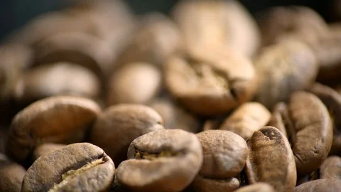 Fragrant coffee beans are roasted in a frying pan. The composition scrolls sl Video stock 122336114