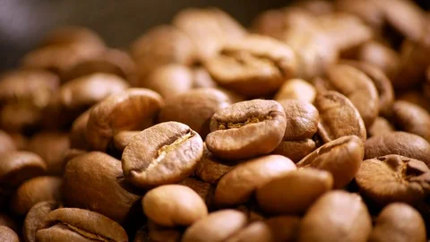 Fragrant coffee beans are roasted in a frying pan. The composition scrolls sl Video stock 122336213