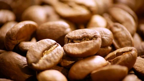 Fragrant coffee beans are roasted in a frying pan. The composition scrolls sl Video stock 122336367