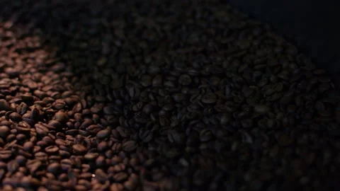 Fragrant coffee beans are roasted in a frying pan, Stock Footage 150761280