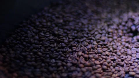 Fragrant coffee beans are roasted in a frying pan Stock Footage 150761283