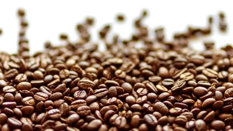 Fragrant coffee beans are roasted in a frying pan, smoke comes from coffee beans 스톡 동영상 172385862