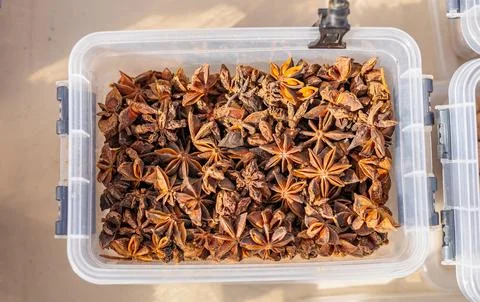 Fragrant colored bulk spices by weight. Loose red, yellow and green spices. C Stock Photos