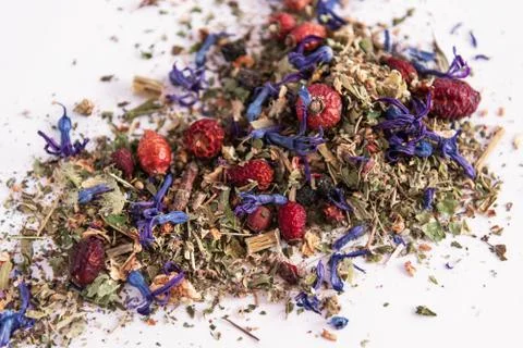 Fragrant multicolored healthy herbal tea Stock Photos