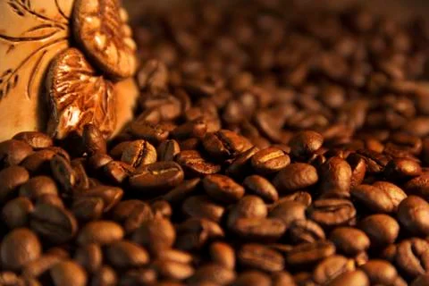 Fragrant roasted coffee beans brown and cup Stock Photos