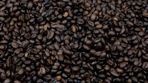 Fragrant roasted coffee beans fall Stock Footage 107163610