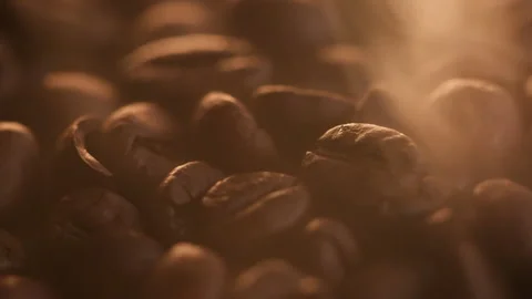 Fragrant Roasted Coffee Beans Surrounded By Wispy Smoke Trails, Macro Close Up Stock Footage 307701928