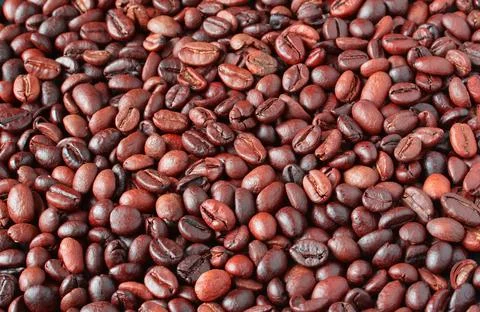 Fragrant, roasted coffee beans, top view, background from coffee beans Stock Photos