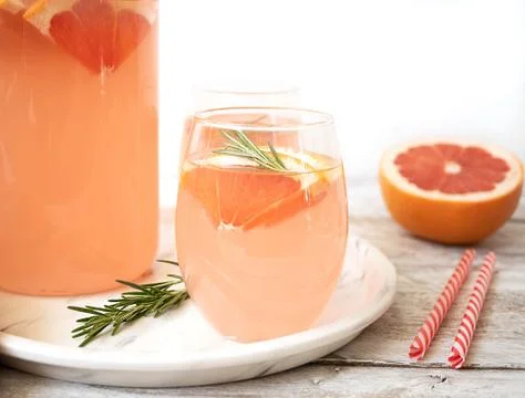 Fragrant summer drink with coniferous notes. Grapefruit juice mixed. Photos