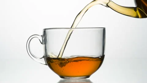 Fragrant Tea is Poured Into a Cup 4K Stock Footage 172219675