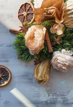 Fragrant winter holidays composition with cinnamon star anice dried orange sl Stock Photos