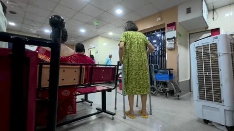 Frail senior woman with a disability using a walker for support. Stock Footage 337458362
