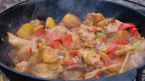 Frame of adding salt to a dish. Salt is added to the dish in the cauldron, slow Stock Footage 278463469
