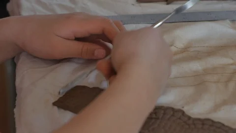 In the frame are children's hands. Stock Footage 87376441
