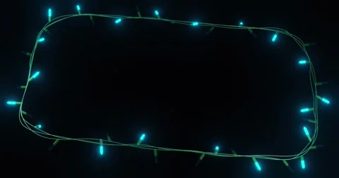 Frame of blue christmas string lights flashing on black background, copy space Stock Footage 329703912