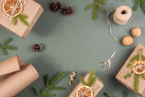 Frame, border made from boxes, craft paper, twine, scissors, dried oranges an Stock Photos