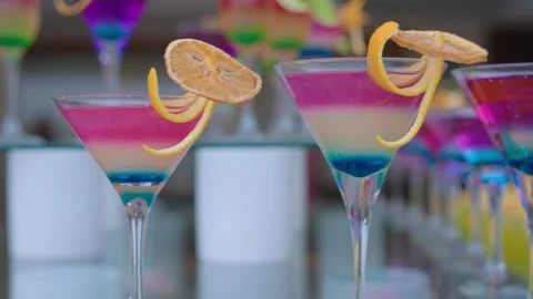 The frame captures a multitude of beautiful and colorful cocktails in Stock Footage 243499705