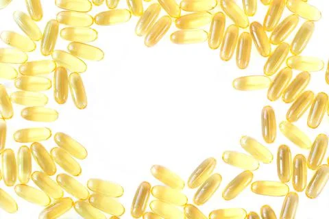 Frame of cod liver or fish oil with omega 3 capsules Foto stock