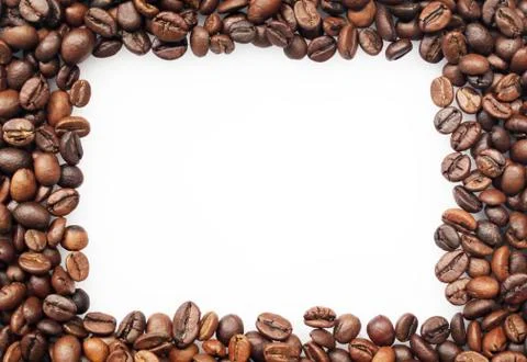 Frame of coffee beans with space for text on a white background Foto stock