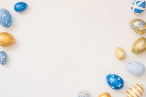 Frame of Easter decorated eggs isolated on white background. Minimal easter Stock Photos