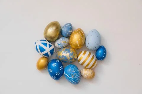 Frame of Easter decorated eggs isolated on white background. Minimal easter 스톡 사진