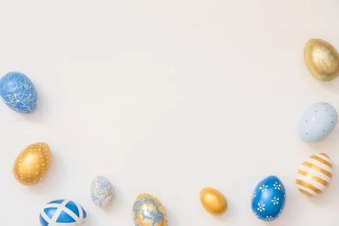 Frame of Easter decorated eggs isolated on white background. Minimal easter Stockfoto's