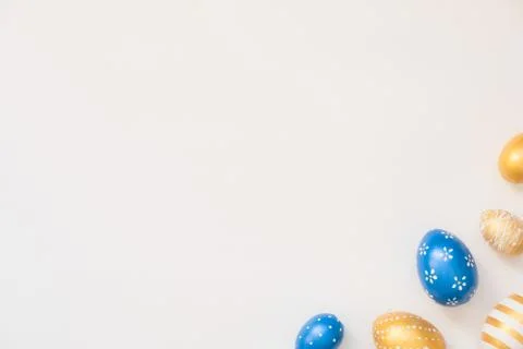 Frame of Easter decorated eggs isolated on white background. Minimal easter Stock Photos