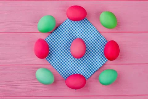 Frame from Easter eggs on pink background. Stock Photos