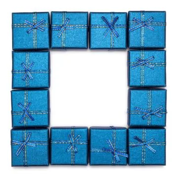 A frame of gift boxes isolated on white background. Blue Christmas gifts. Stock Photos