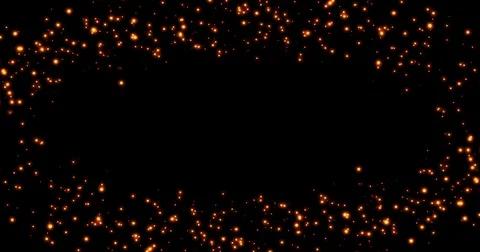 Frame of golden glitter sparkle bubbles particles stars on black background Stock Footage