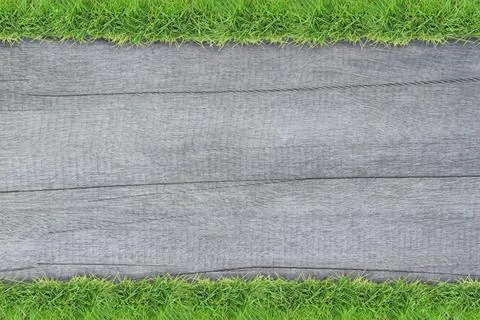 Frame from grass with old plank background Stockfoto's