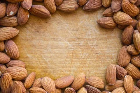 Frame made from almonds. Stock Photos