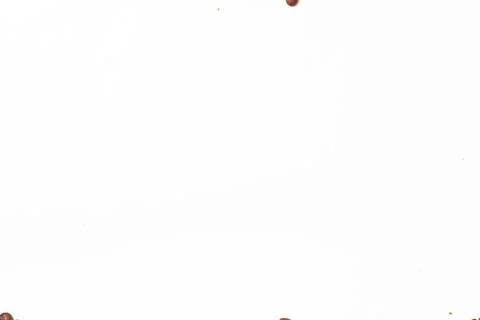 Frame made of coffee beans. Pattern from roasted coffee beans. Stock Photos