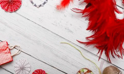 Frame made of easter eggs and spring flowers on white wooden background. East Stock Photos