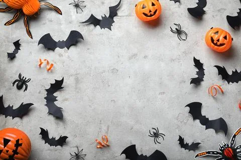 Frame made with Halloween decor elements on light grey background, flat lay.  Stockfoto's