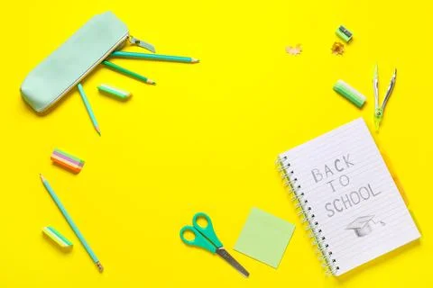 Frame made of notebook with text BACK TO SCHOOL, stationery and different rub Stock Photos