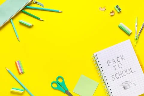 Frame made of notebook with text BACK TO SCHOOL, stationery and different rub Stock Photos