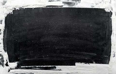 Frame made of rectangular flour on a black background for inscriptions. Stock Photos