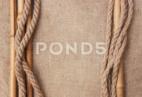 Frame made of ropes and bamboo with a canvas of burlap Stock Photos